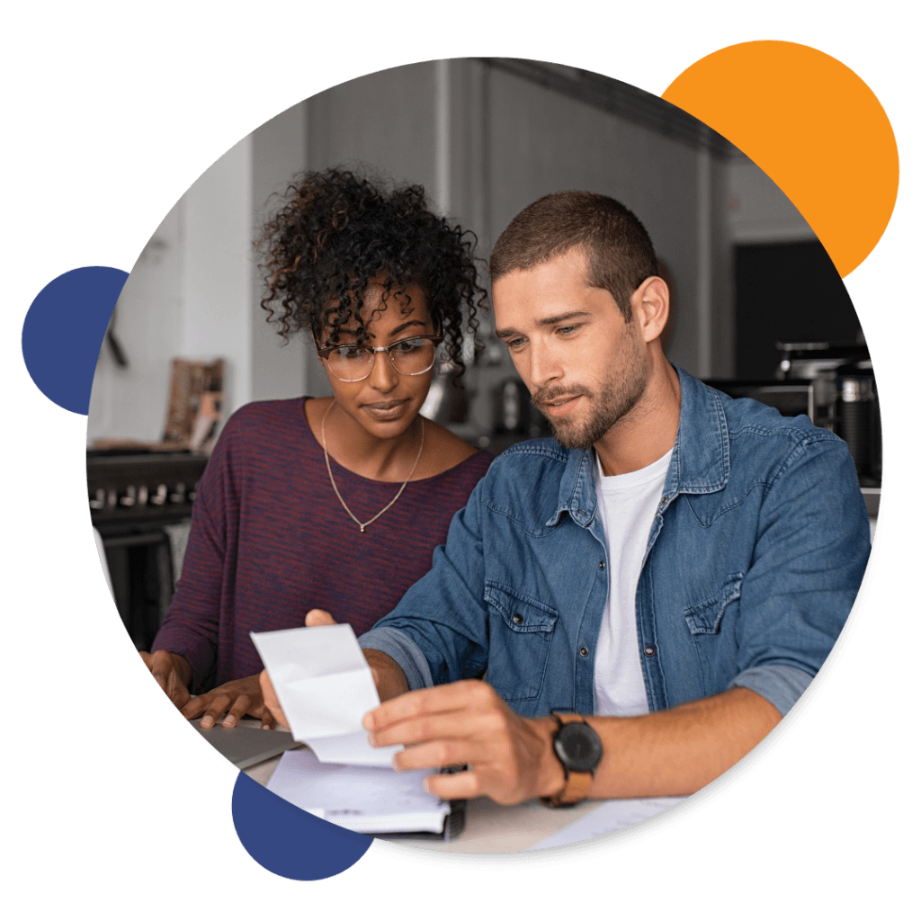 Couple looking at finance documents - Chattel Mortgage Page