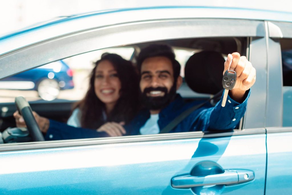 Happy couple getting their car | Featured image for the Private Sale Car Finance Page from eCarz.